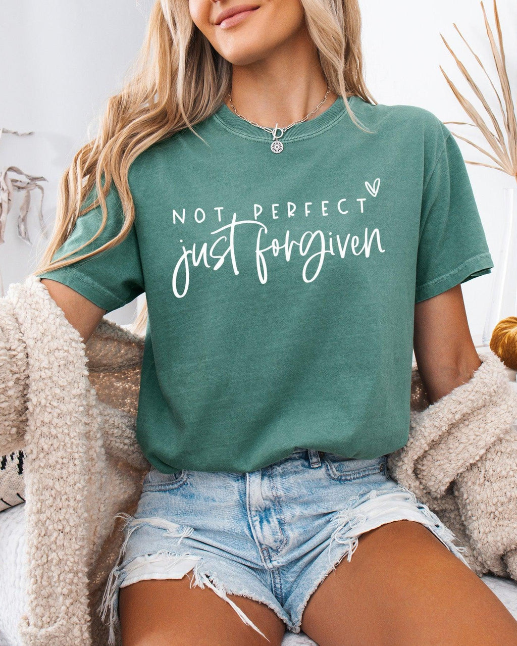 Green unisex T-shirt with crew neck and 'Not perfect, just forgiven' script graphic