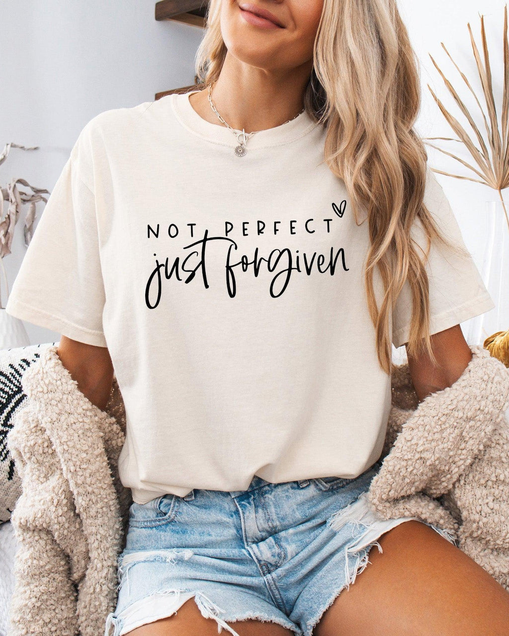 Ivory garment-dyed T-shirt with “Not perfect, just forgiven” graphic