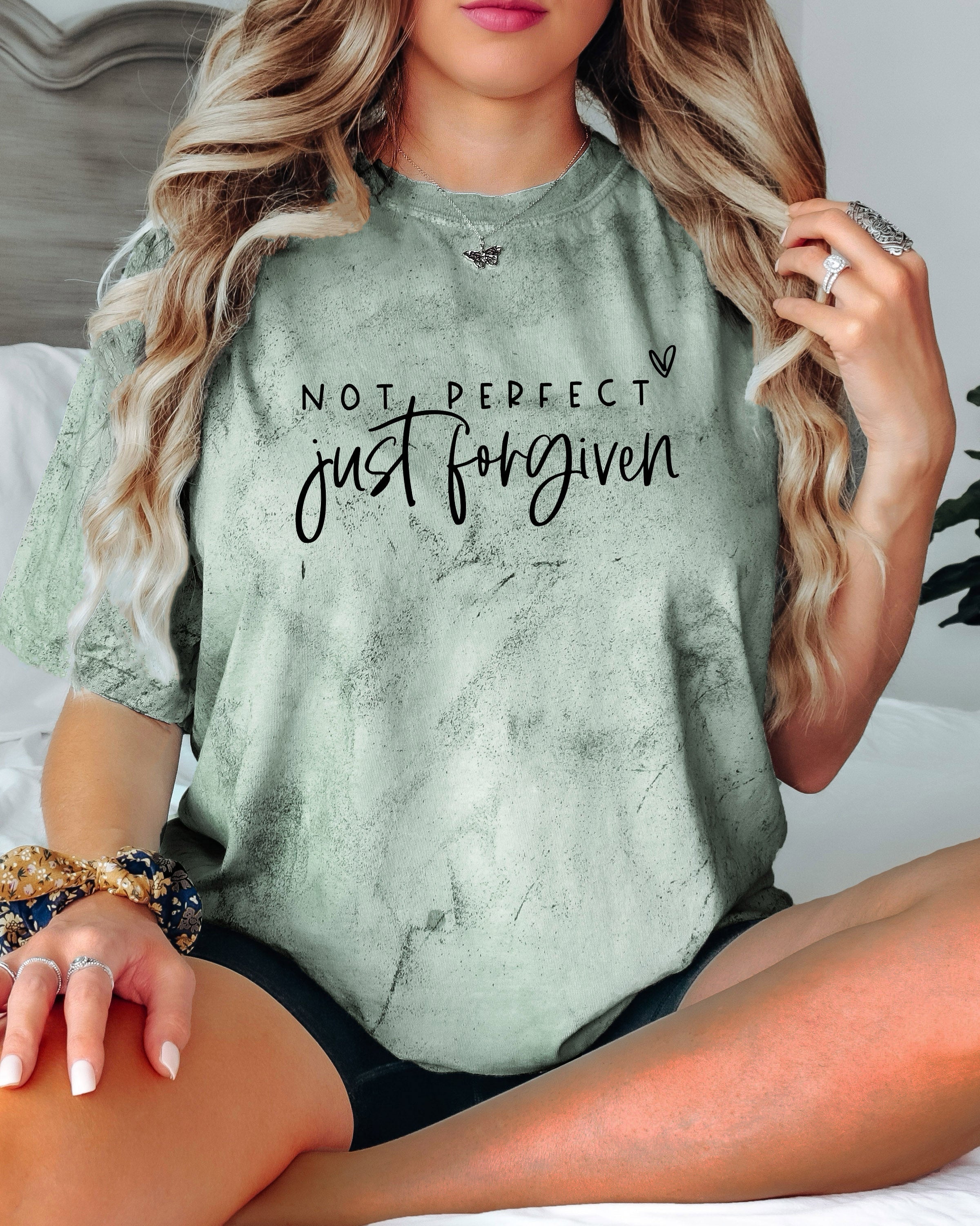 Sage green garment-dyed T-shirt with “Not perfect, just forgiven” graphic