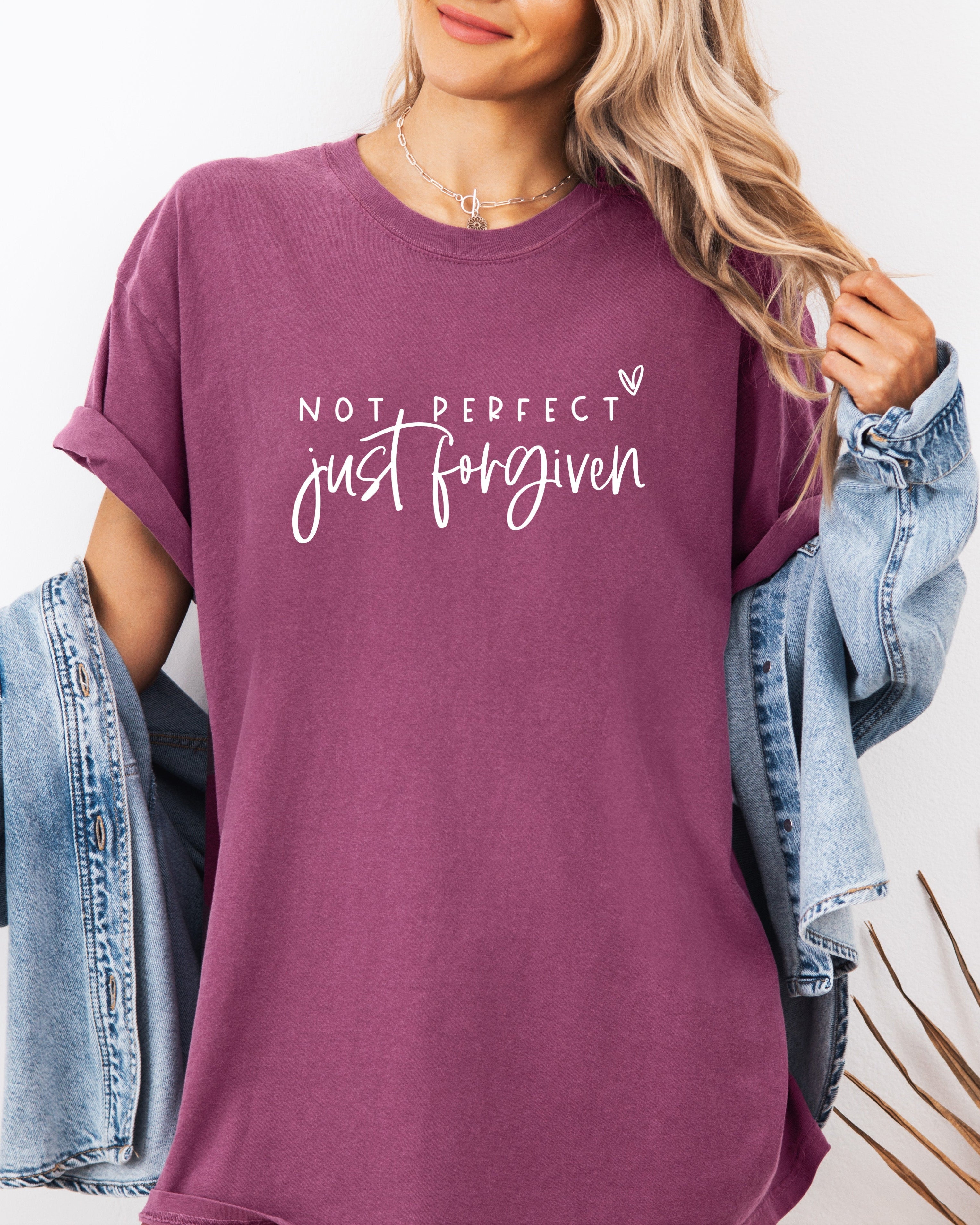 Berry purple garment-dyed T-shirt with “Not perfect, just forgiven” graphic