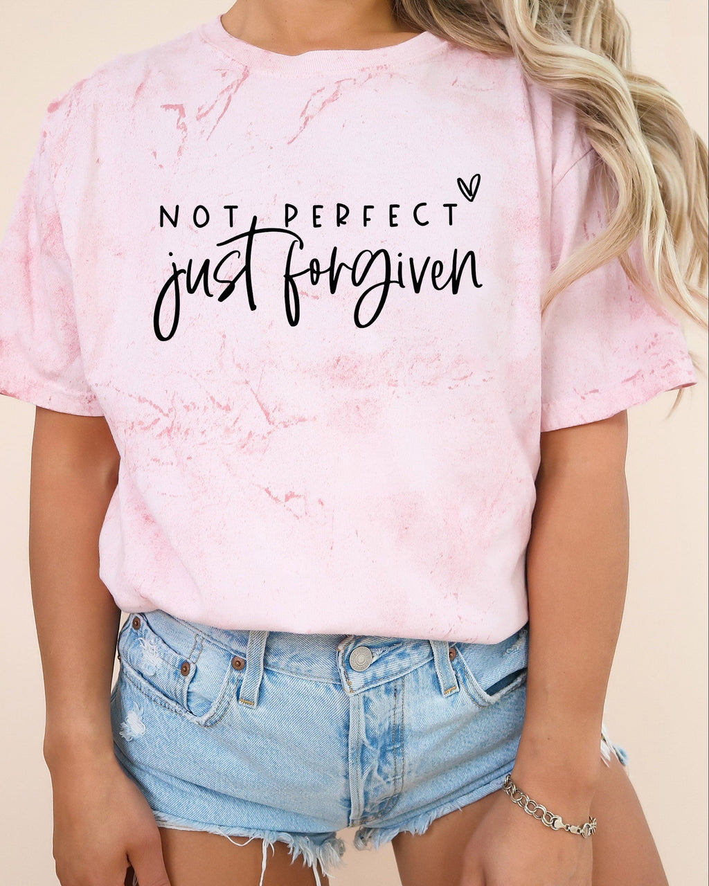 Blush pink garment-dyed T-shirt with “Not perfect, just forgiven” graphic