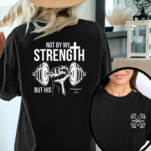 Black vintage graphic t-shirt with weightlifting “NOT BY MY STRENGTH” front print