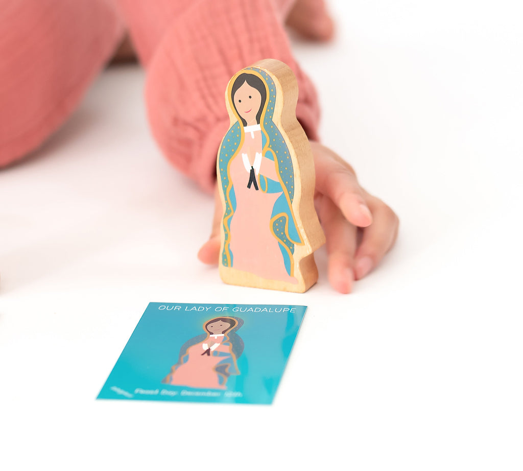 Guadalupe devotional card with standing Our Lady illustration on front, blue title strip