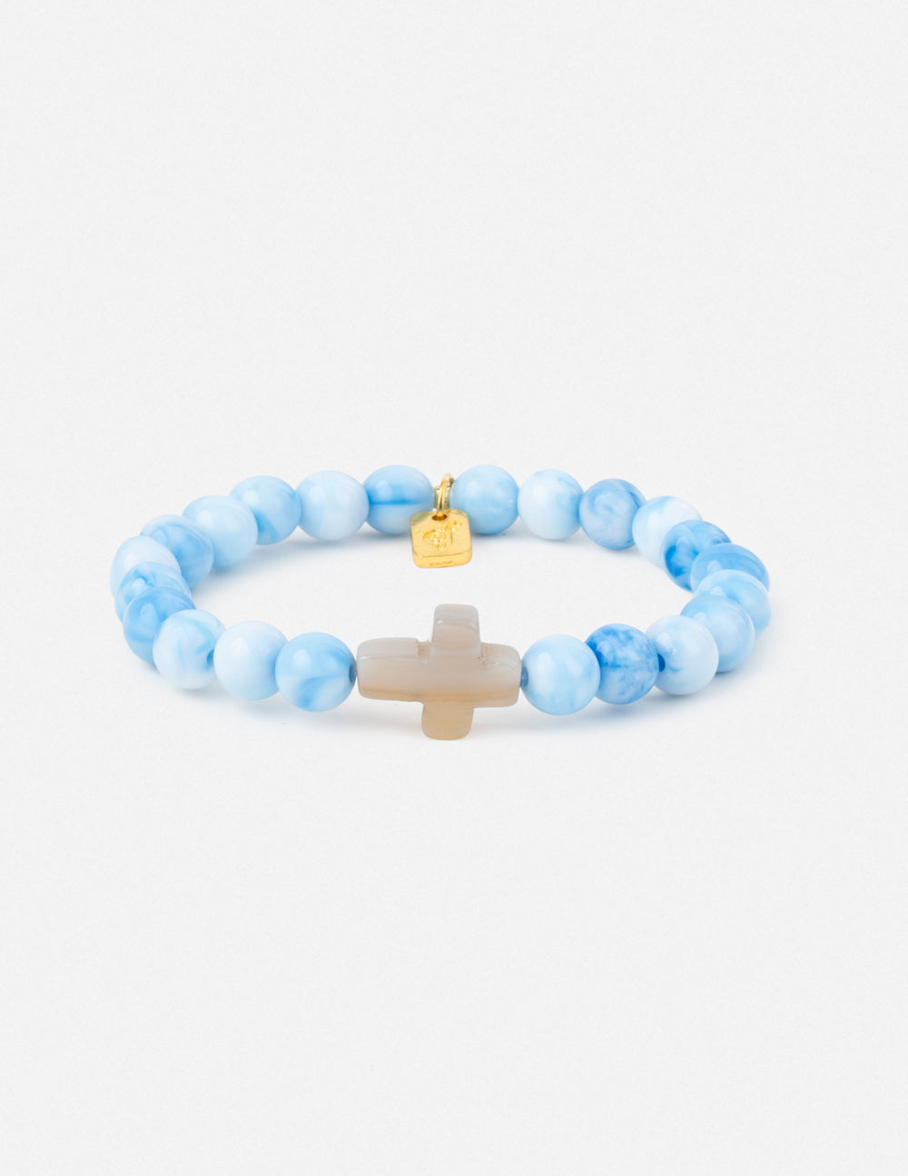 Light blue beaded cross bracelet with pale cross centerpiece and small gold charm