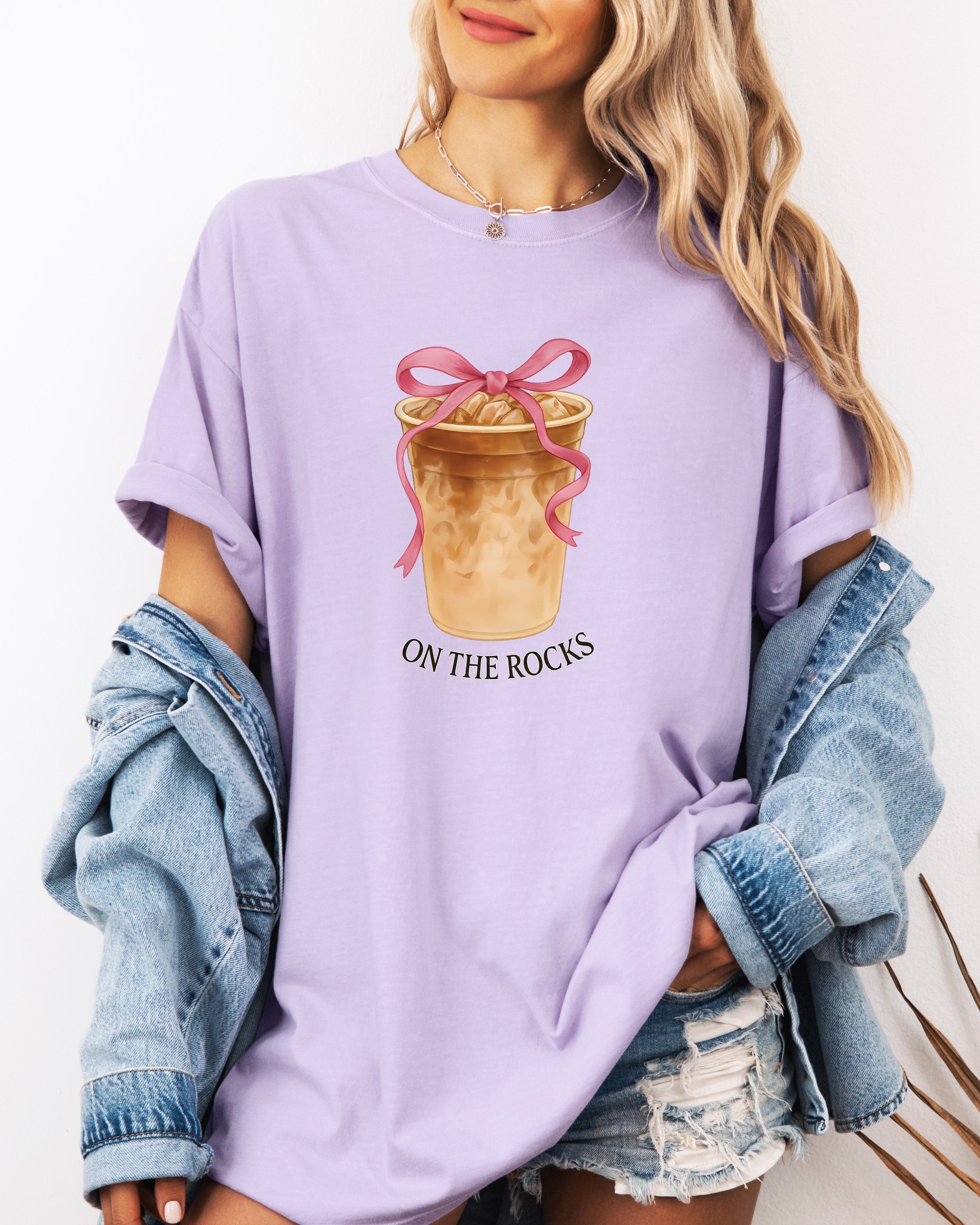 Periwinkle lavender iced latte graphic T-shirt with ribboned cup and “ON THE ROCKS”