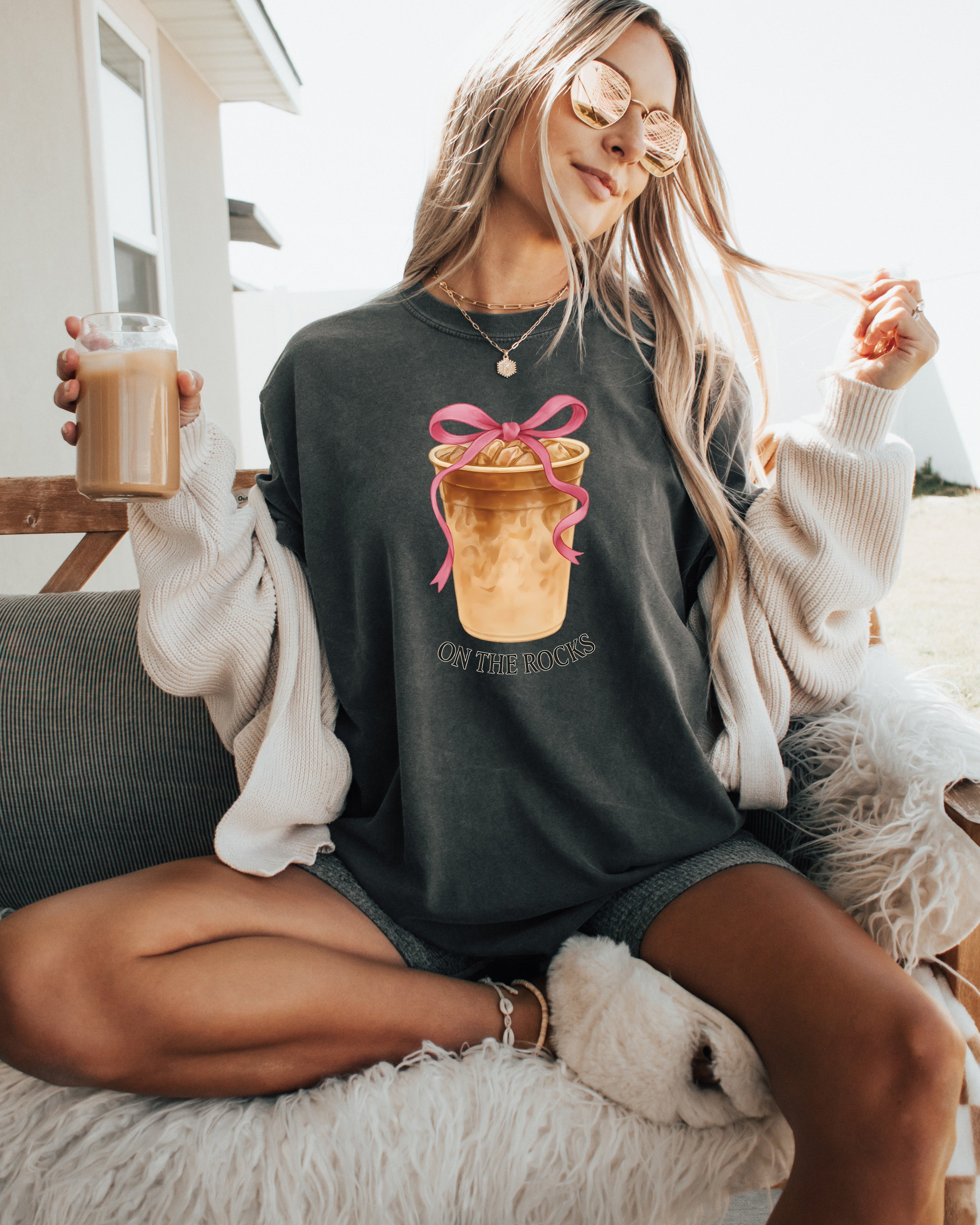 Dark gray iced latte graphic T-shirt with ribboned cup and “ON THE ROCKS”