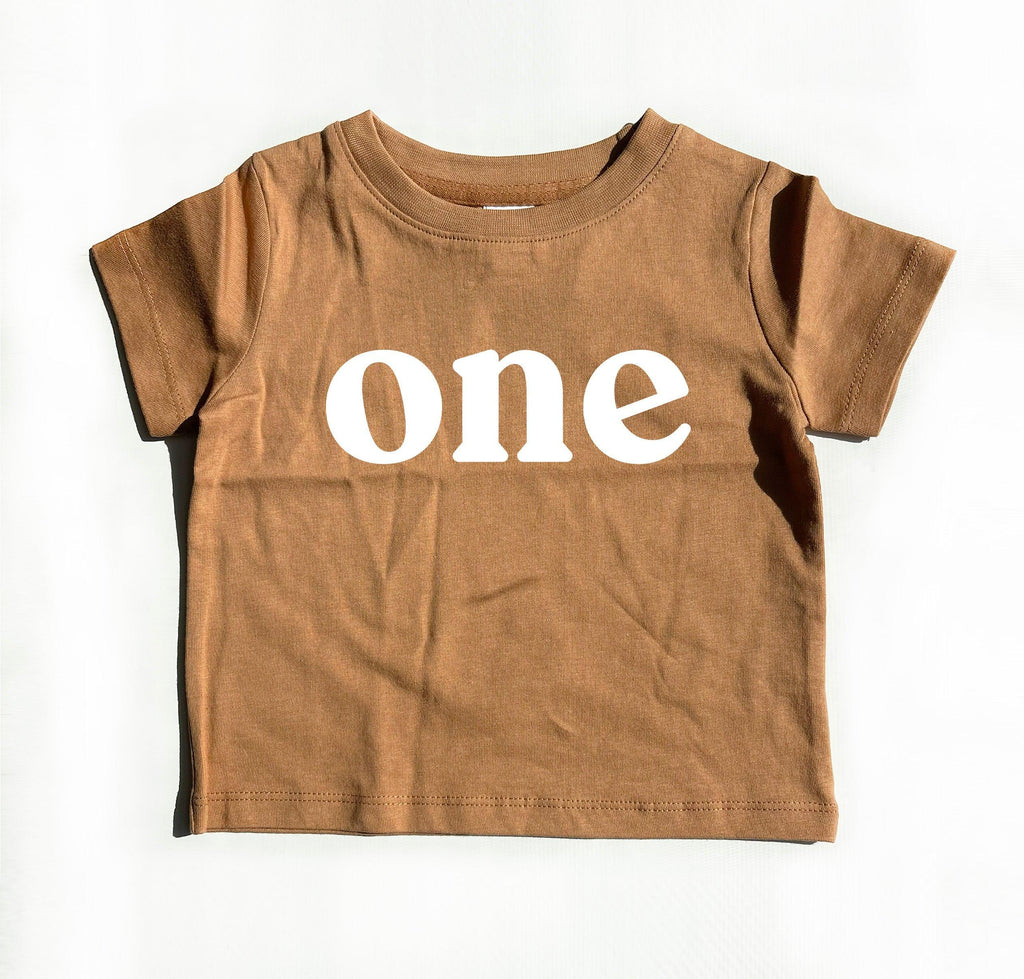 Ginger brown kids organic cotton tee with 'one' serif graphic