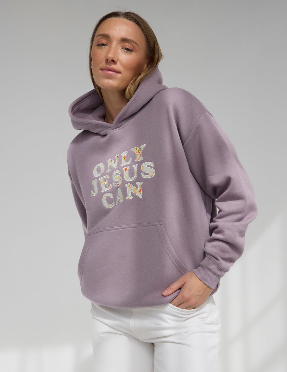 Lilac unisex hoodie with hood, "ONLY JESUS CAN" print on the chest