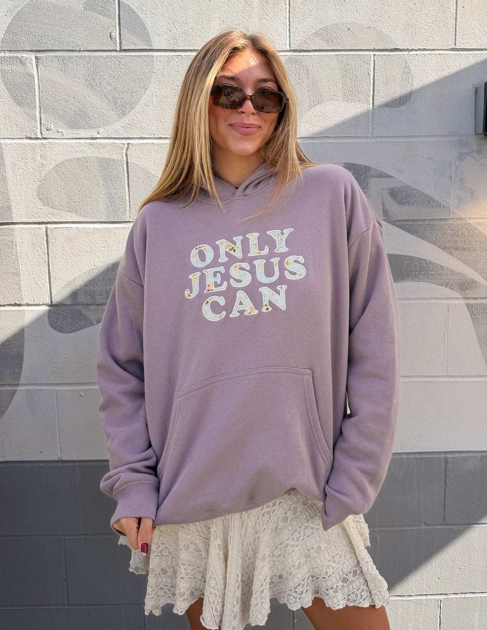 Lilac unisex hoodie with hood and front pocket, "ONLY JESUS CAN" chest print
