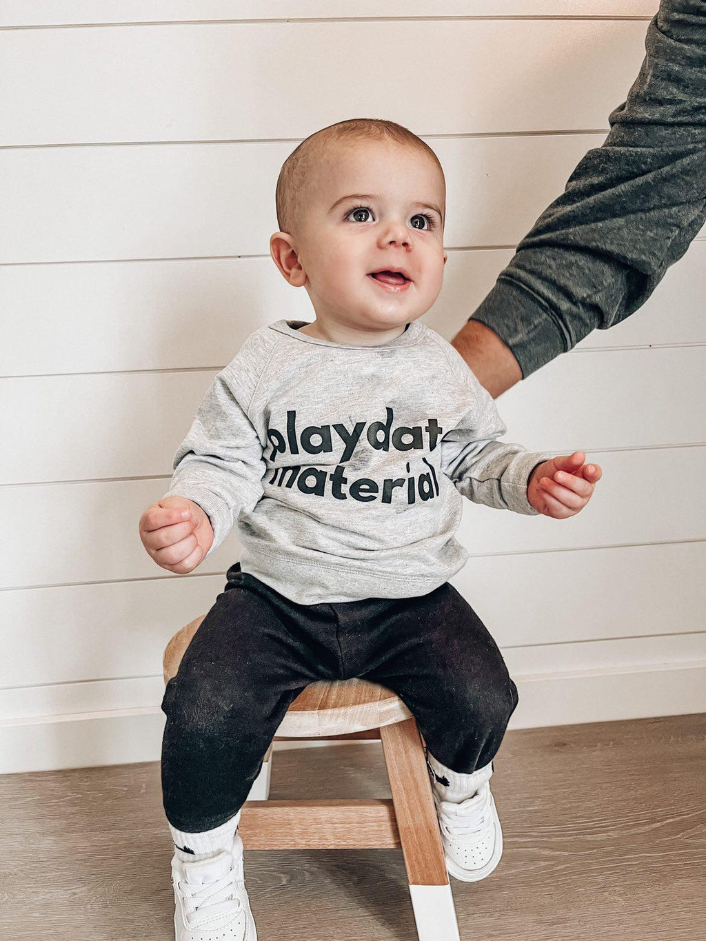 Toddler heather grey crewneck sweatshirt with “playdate material” graphic
