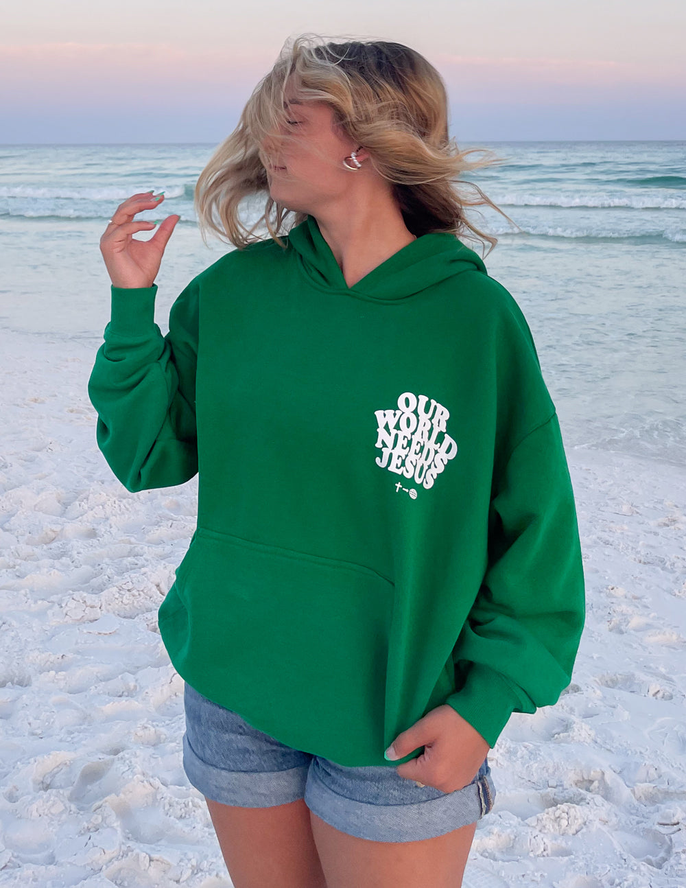 Green unisex hoodie with white chest logo and front pouch pocket