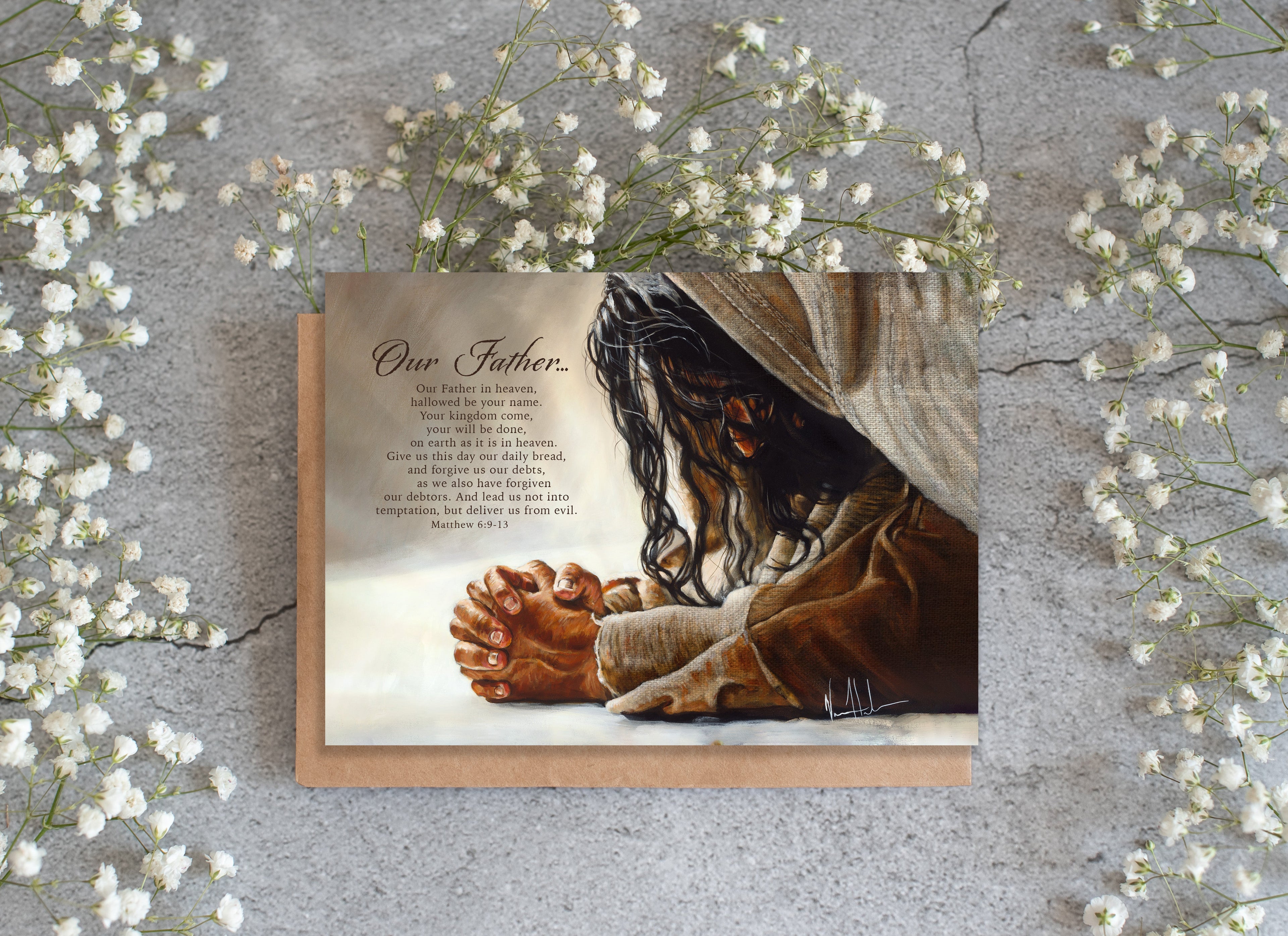 Greeting card front with Jesus praying hands, brown and beige art, small religious text