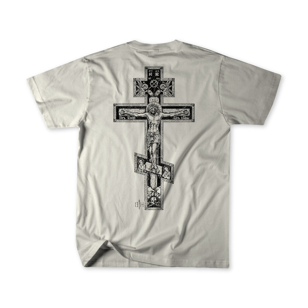 White premium tee with centered cross graphic print, short sleeves