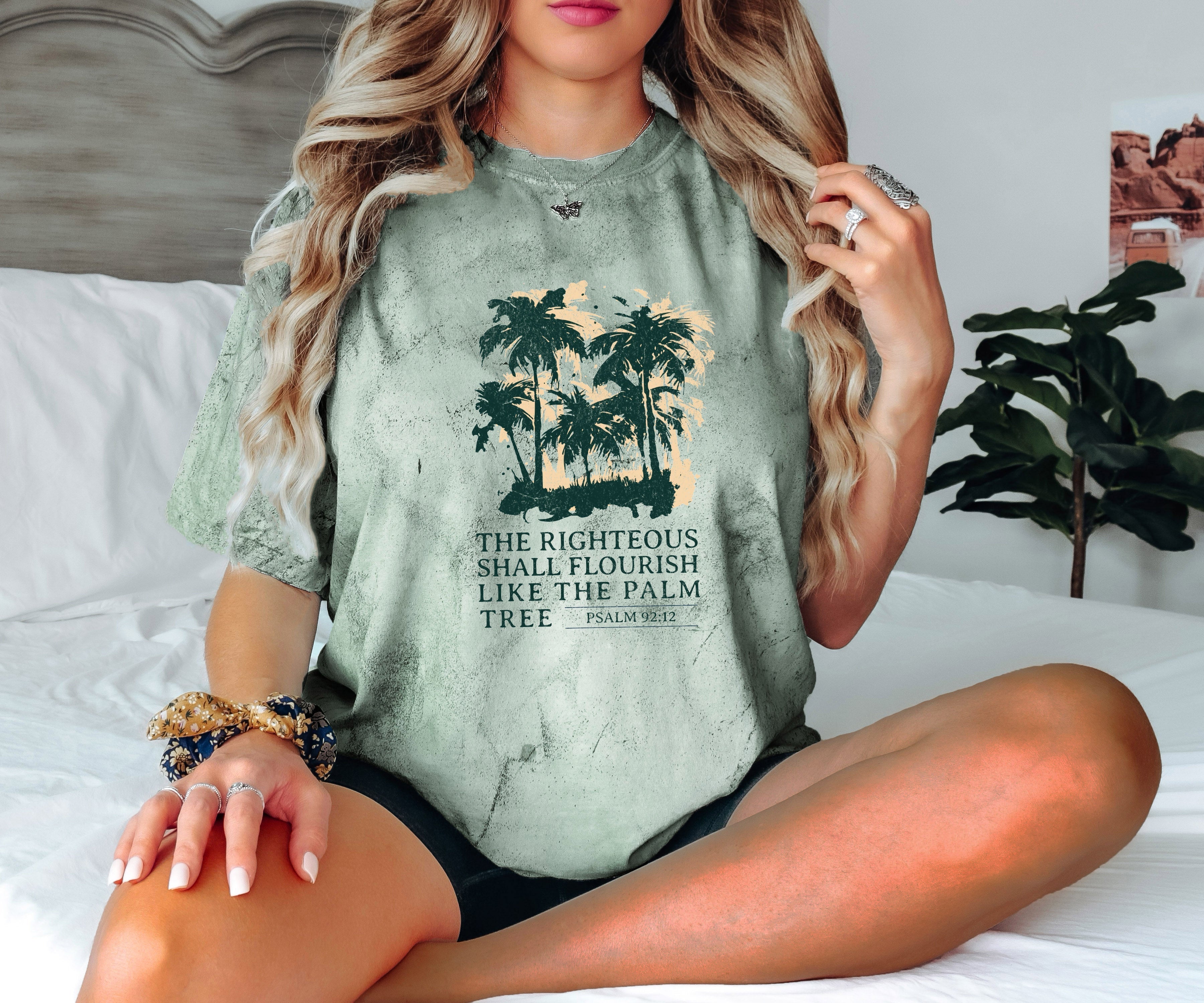Muted green T-shirt with dark green palm tree faith graphic and crew neck