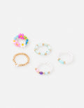 Pastel beaded ring set with stackable blue, pink, purple and yellow bead bands