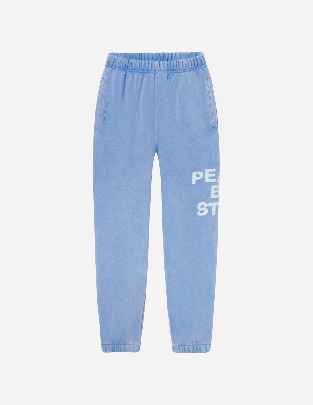 Unisex light blue sweatpants with elastic waistband and printed logo on leg.