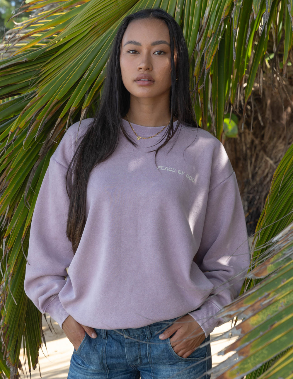 Lavender unisex crewneck sweatshirt with small chest logo and long sleeves