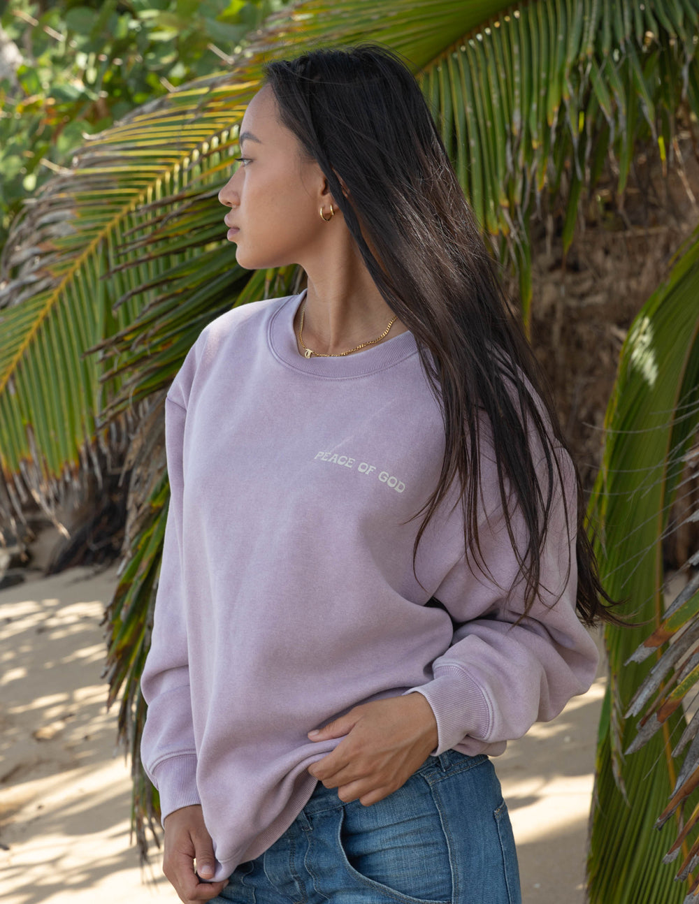 Lavender unisex crewneck sweatshirt with small chest logo and crew neckline