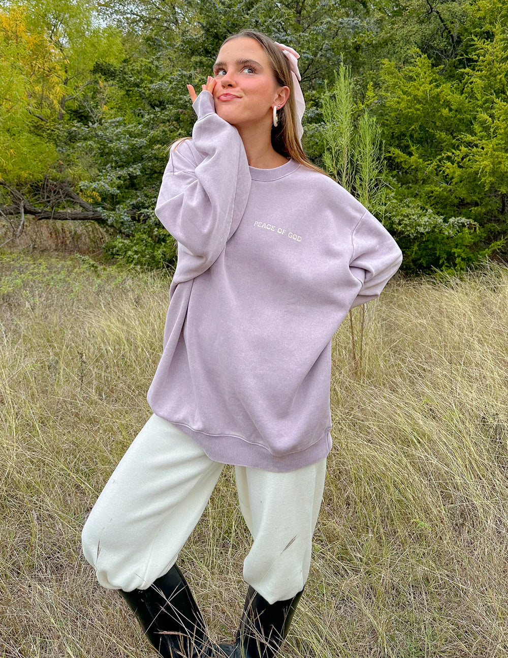 Lavender unisex crewneck sweatshirt with small chest print and crew neckline