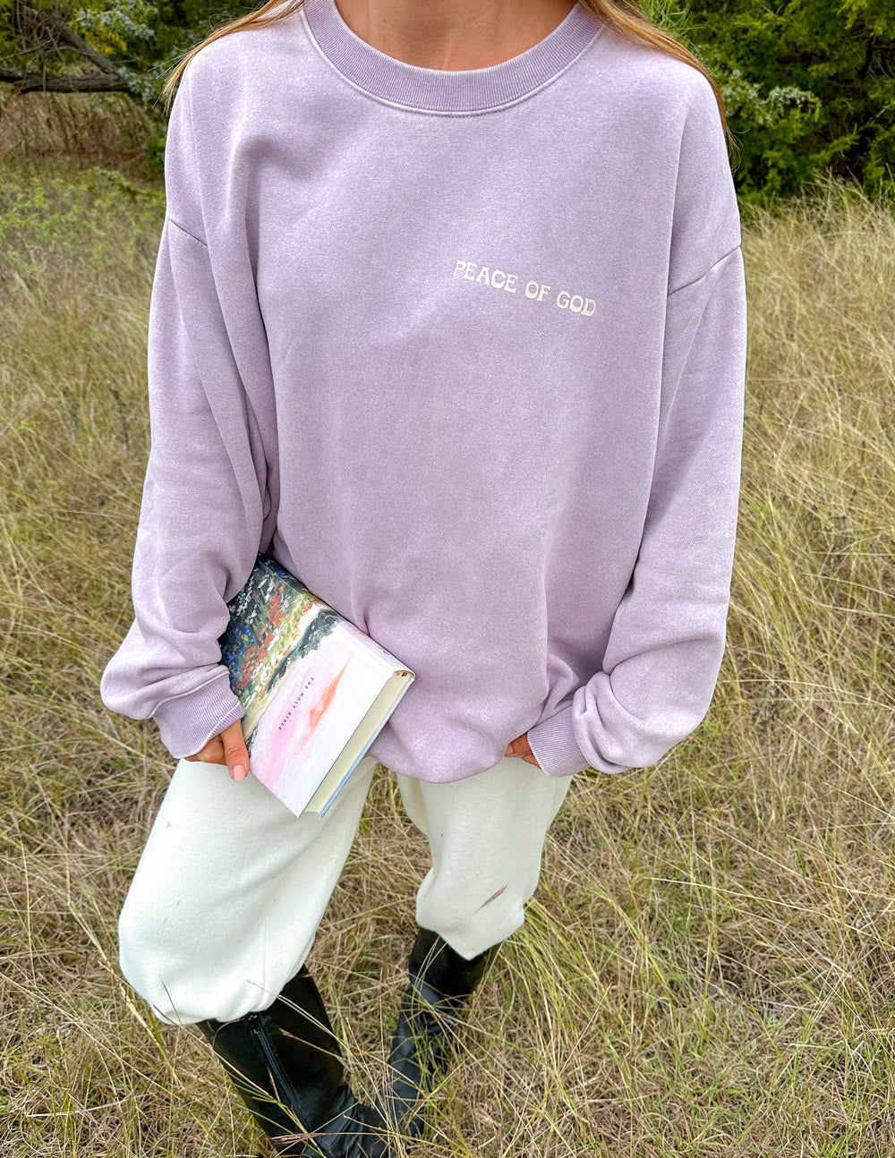 Lavender unisex crewneck sweatshirt with small chest logo and ribbed cuffs