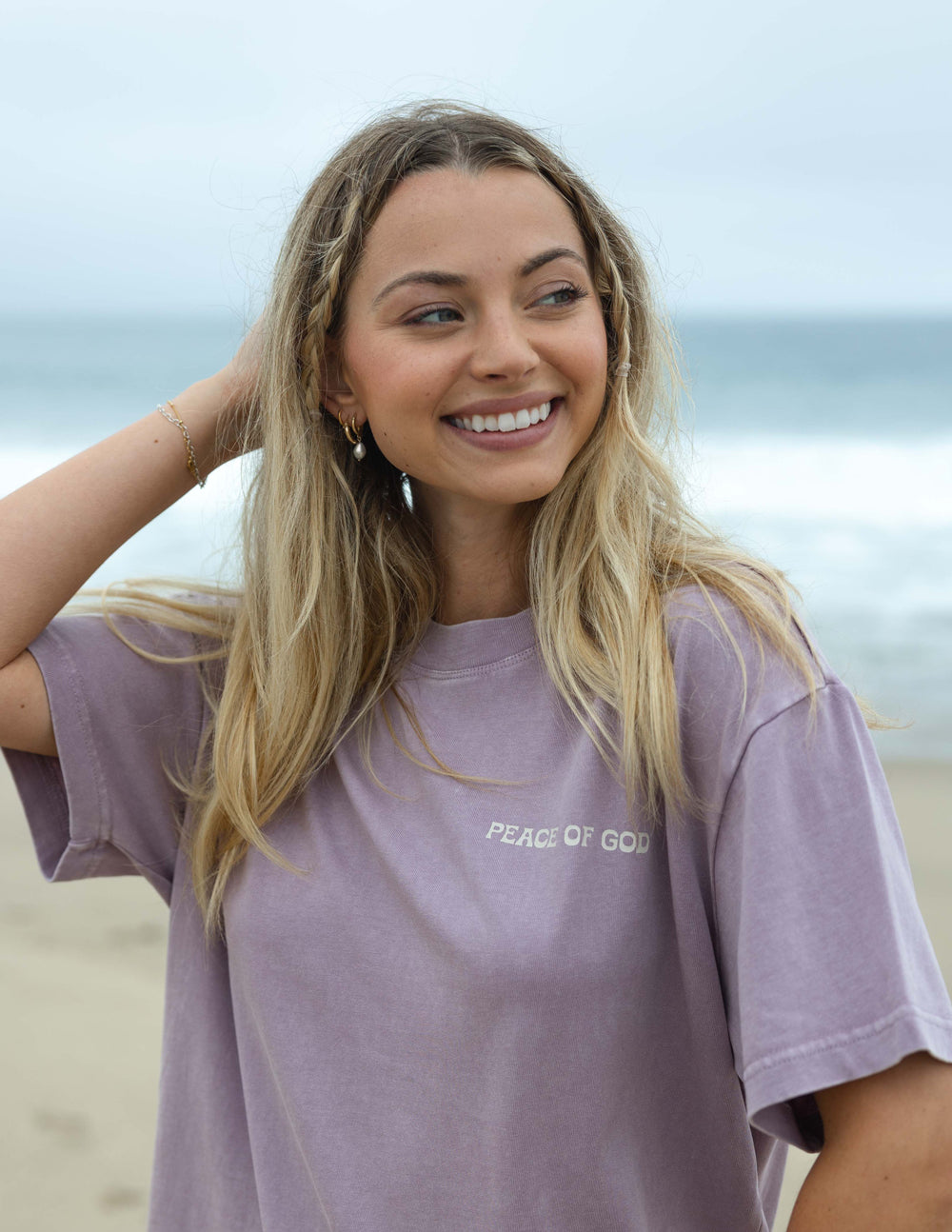 Lavender unisex T-shirt with small chest text "Peace of God"