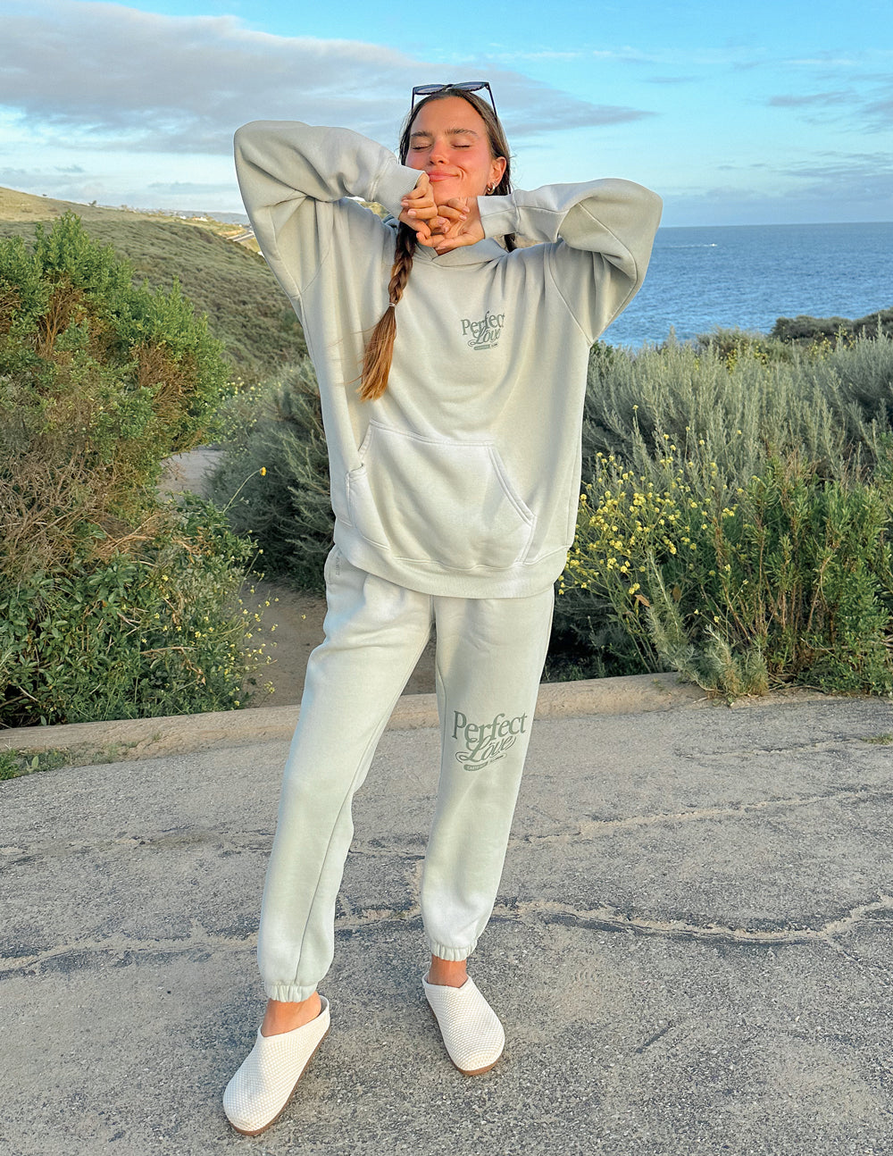 Mint unisex sweatpants with “Perfect Love” logo on leg and elastic jogger cuffs
