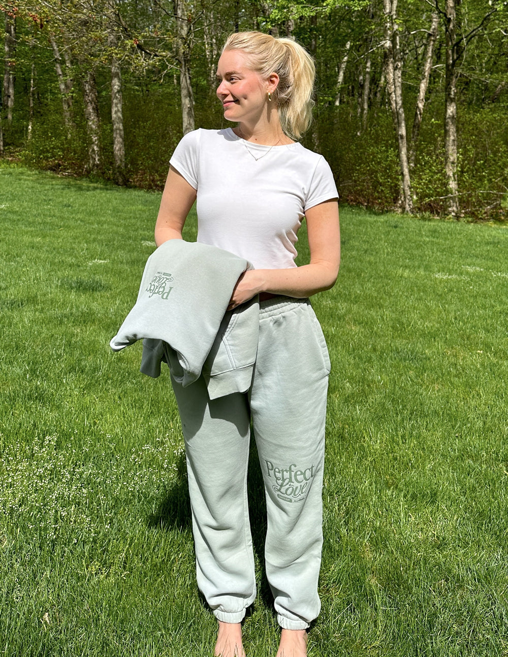 Mint unisex sweatpants with “Perfect Love” print on leg and cuffed ankle