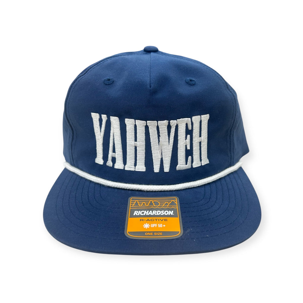 Navy snapback cap with white YAHWEH embroidery and Richardson patch on brim