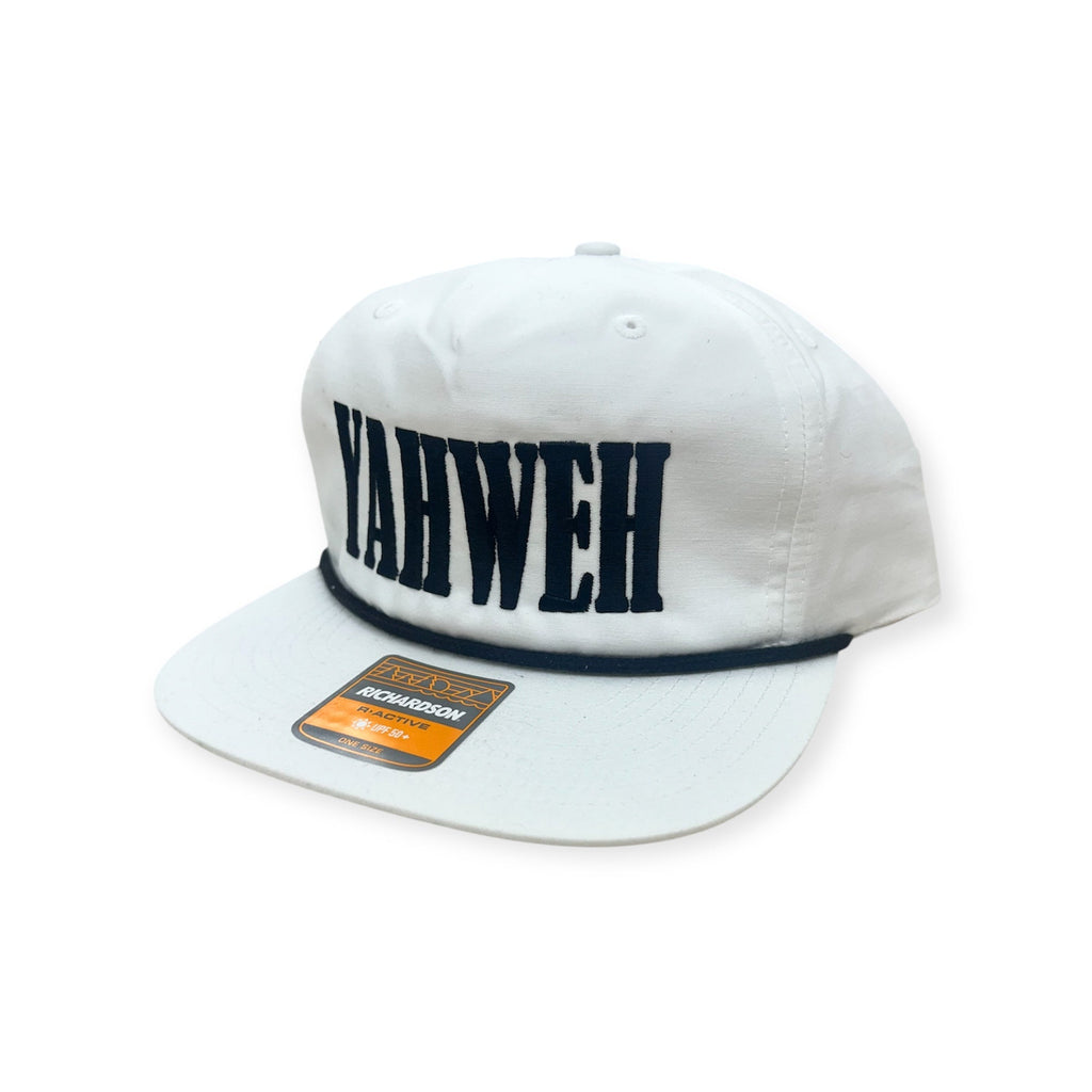 White snapback cap with navy YAHWEH embroidery and front Richardson patch