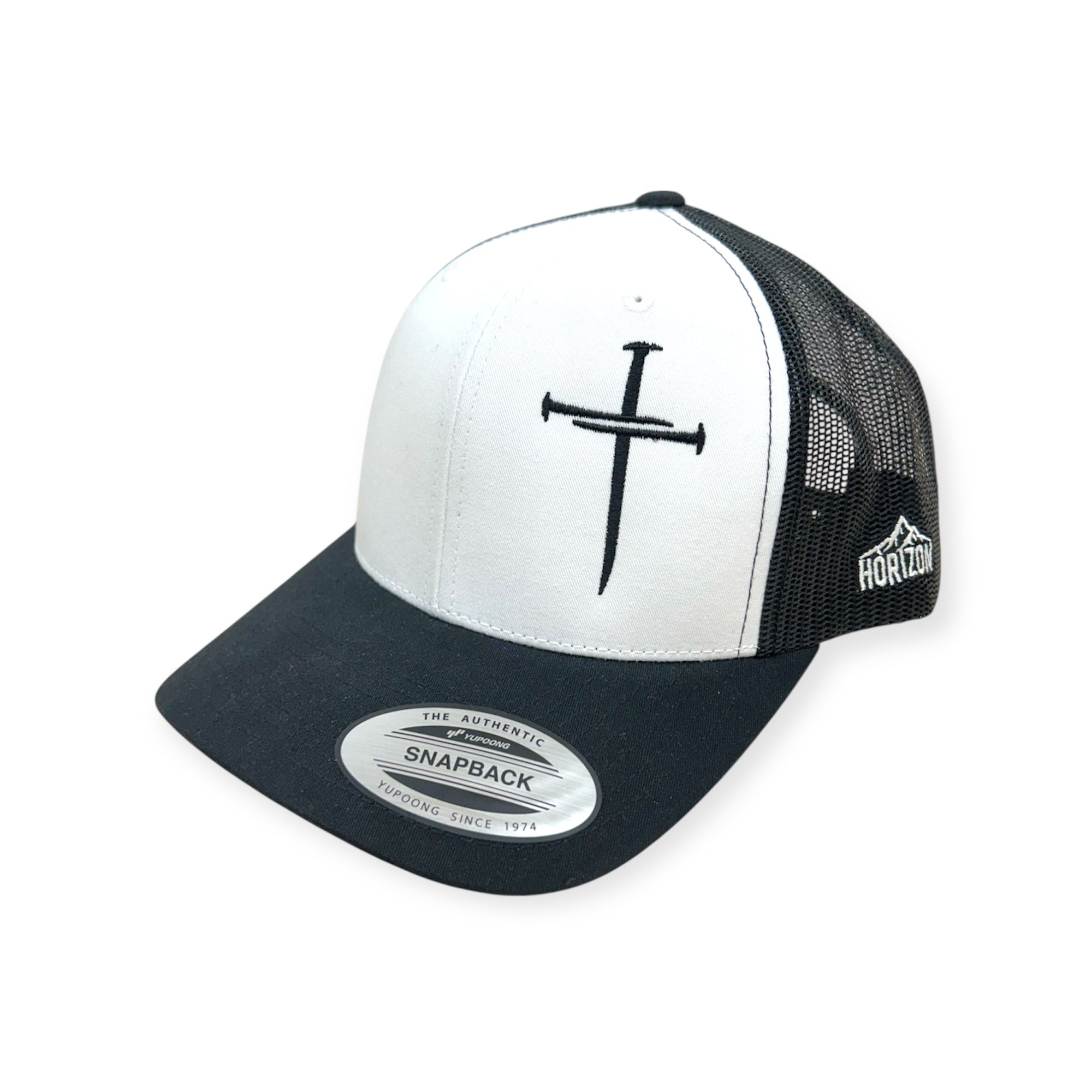 Snapback cap with white crown, black mesh sides, cross embroidery, and brand patch