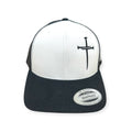 Two-tone snapback hat with white front, black mesh sides, and cross embroidery
