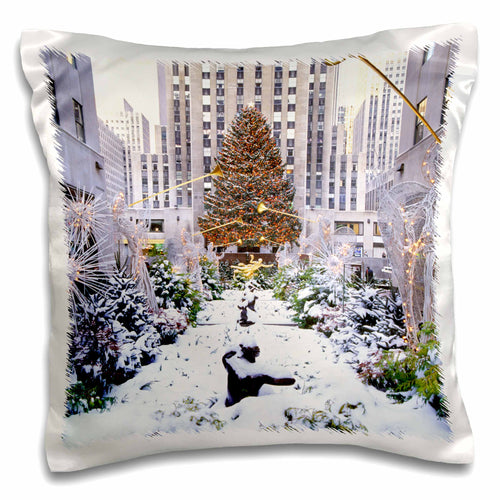 Pillow case with printed snowy city scene and decorated Christmas tree