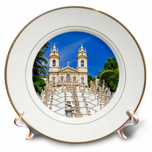 White porcelain decorative plate with gold rim, featuring an architecture photo scene