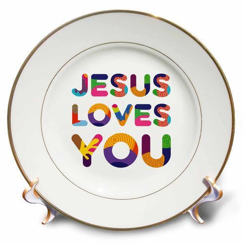 White porcelain plate with colorful 'JESUS LOVES YOU' text and thin gold rim