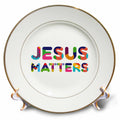 Porcelain plate with 'JESUS MATTERS' colorful lettering and gold rim.