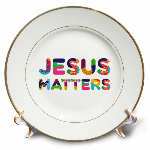 Porcelain plate with 'JESUS MATTERS' colorful lettering and gold rim.