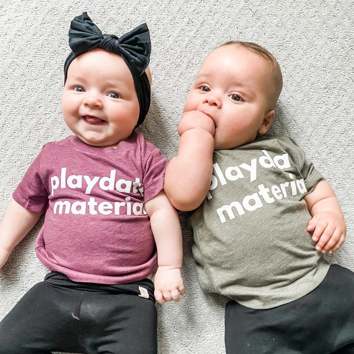Maroon and olive baby and toddler t-shirts with “playdate material” print