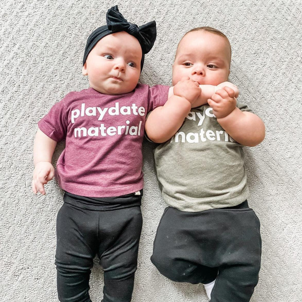 Maroon and olive baby and toddler t-shirts with “playdate material” print