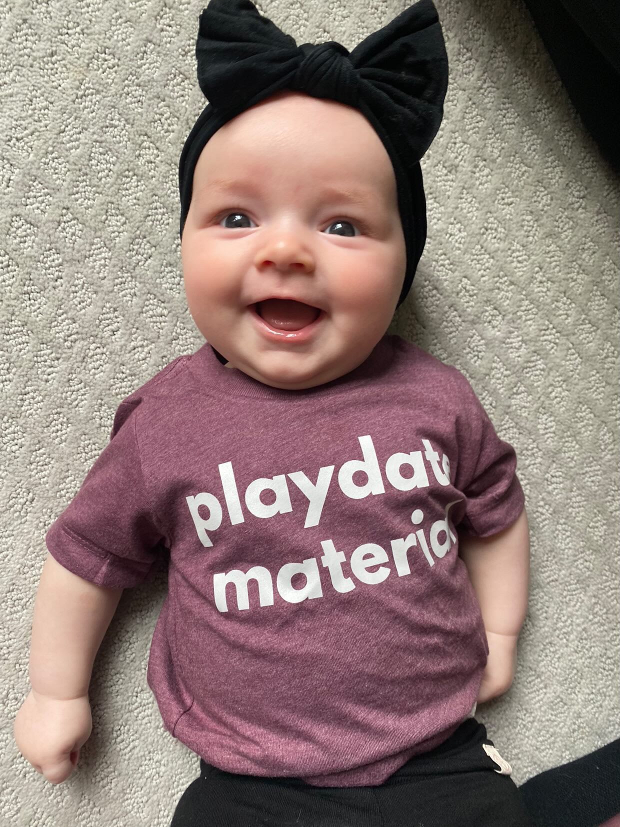 Maroon baby and toddler t-shirt with “playdate material” front print