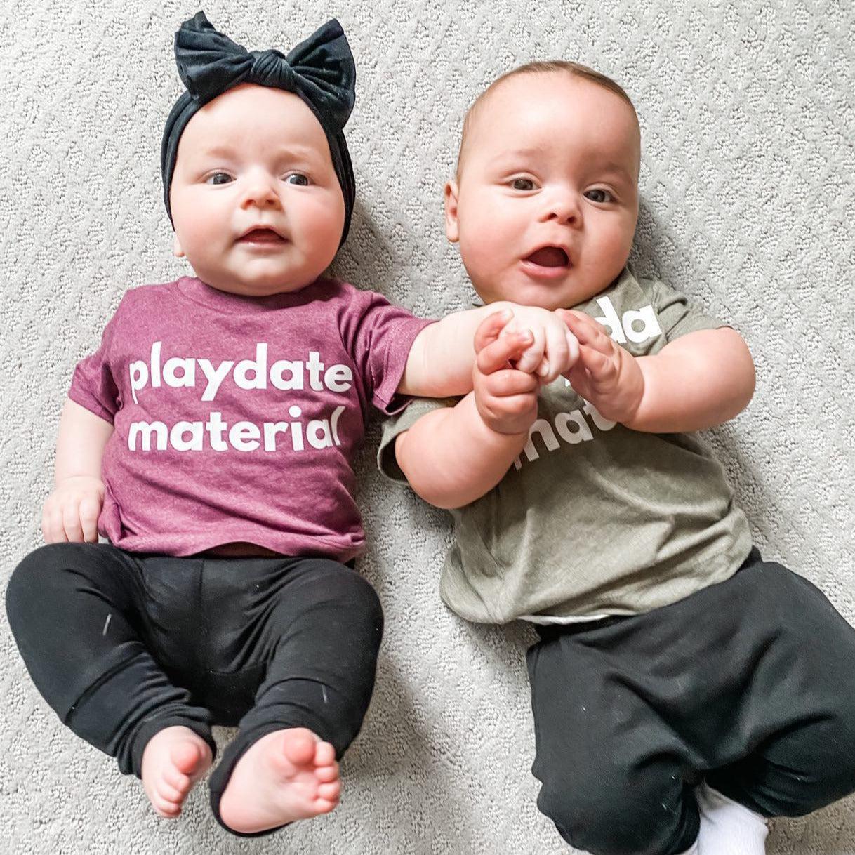 Maroon baby and toddler t-shirt with “playdate material” print