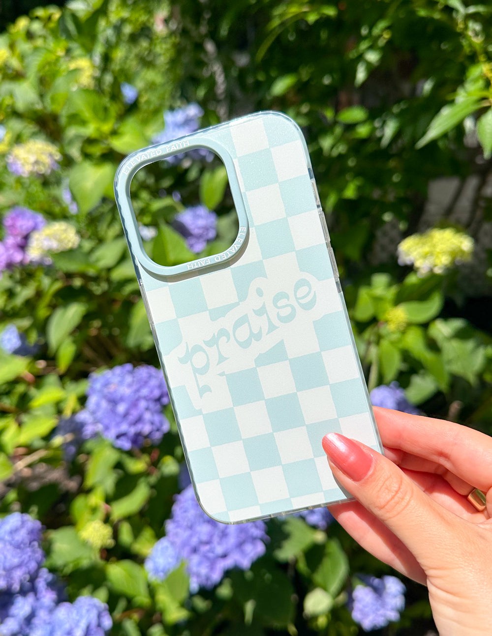 Light blue checkered phone case with side edges and camera cutouts