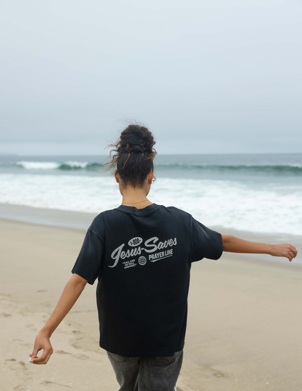Black unisex T-shirt with back 'Jesus Saves' and 'PRAYER LINE' print