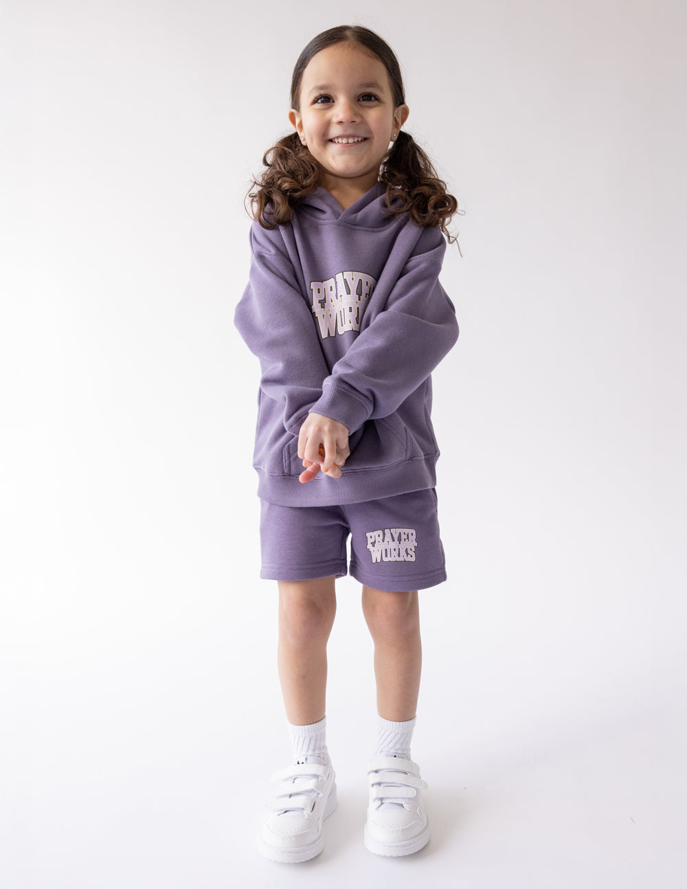 Purple kids hoodie with Prayer Works logo, hood, and kangaroo pocket