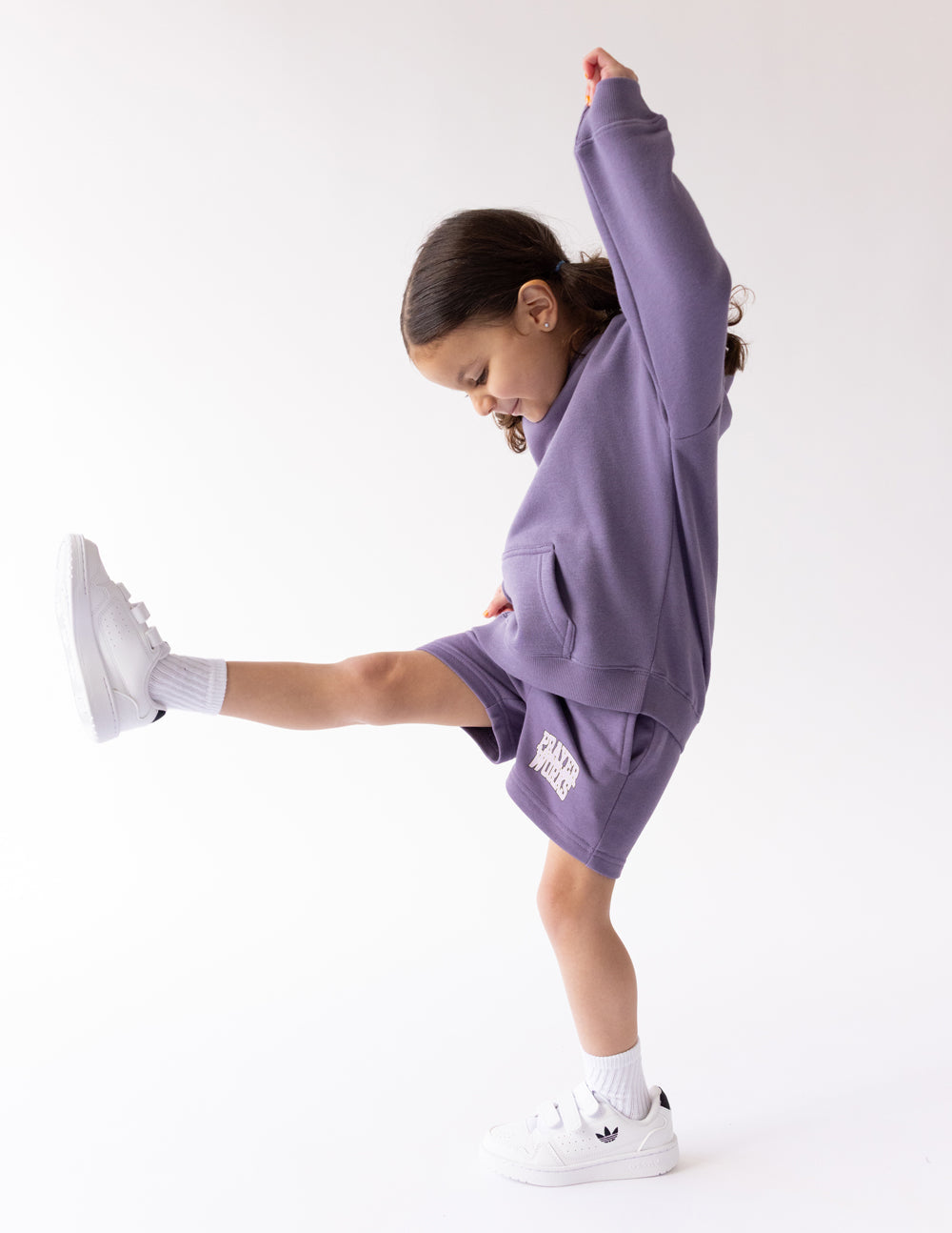Kids purple short with PRAYER WORKS logo and elastic waistband
