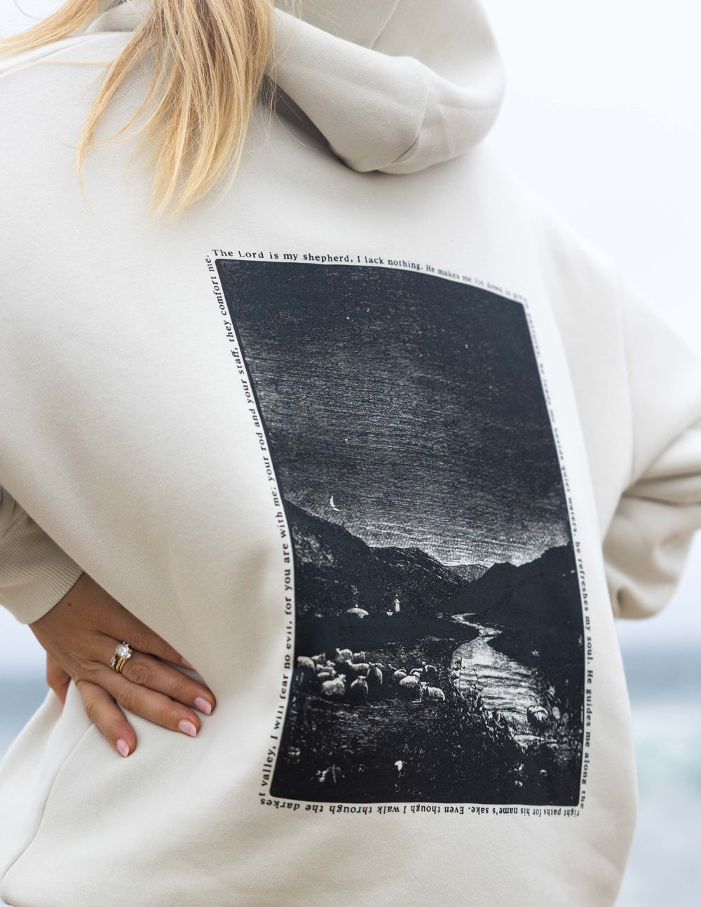 Off-white hoodie close-up of back graphic photo in black