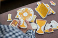 Catholic mass learning toy set with chalice, cross, and communion host pieces