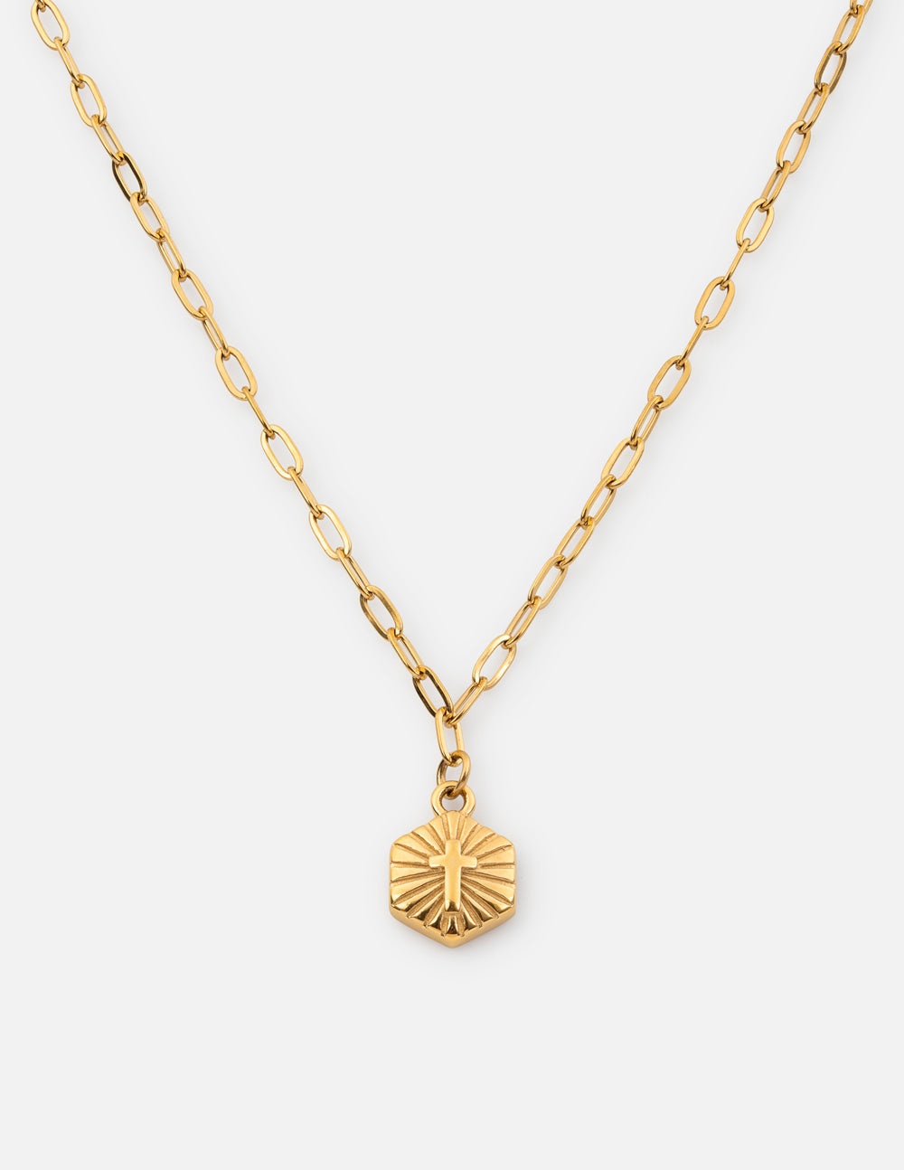 Gold-tone chain necklace with a small radiant pendant
