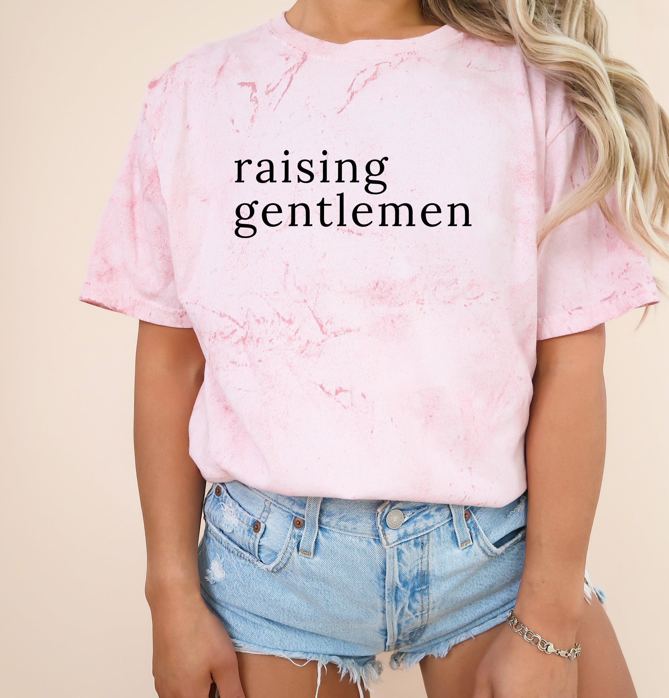 Light pink garment-dyed T-shirt with 'raising gentlemen' graphic