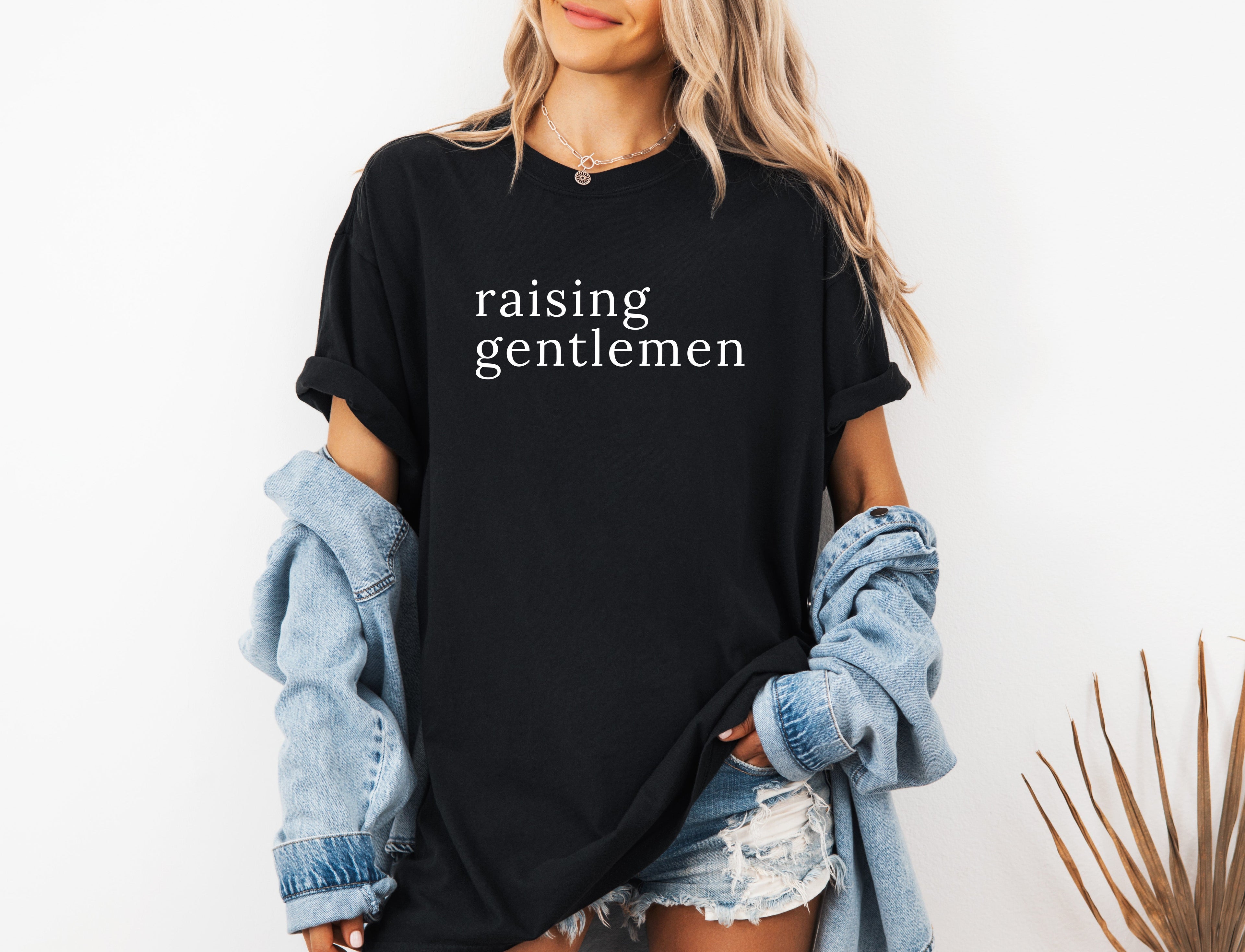 Dyed black T-shirt with “raising gentlemen” print