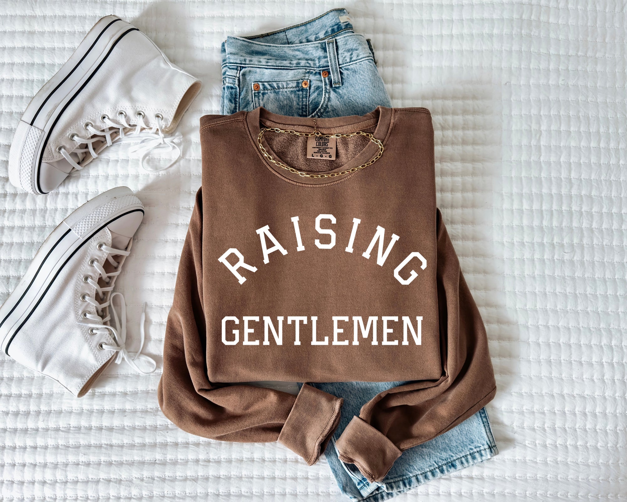 Espresso brown crewneck sweatshirt with "RAISING GENTLEMEN" text print